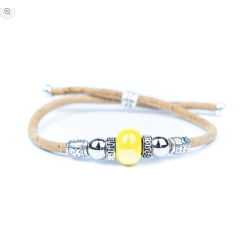 Armb�nd i kork med gul perle