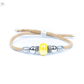 Armb�nd i kork med gul perle