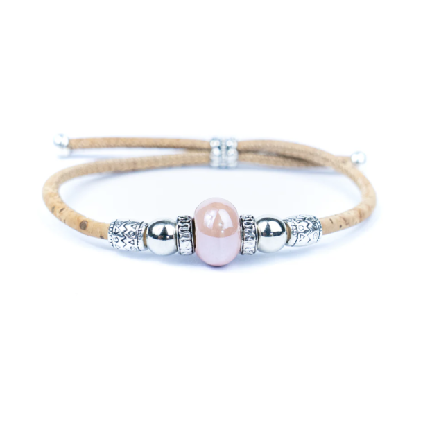 Armb�nd i kork med lyser�d perle