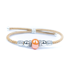 Armb�nd i kork med orange perle