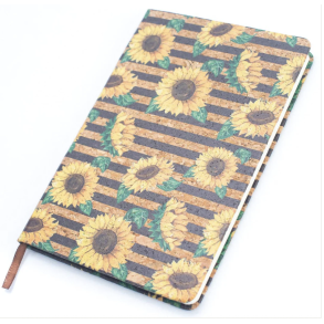 Notesbog i kork med mnster af solsikker