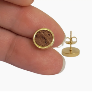 reringe med brunt kork og forgyldt rustfrit stl